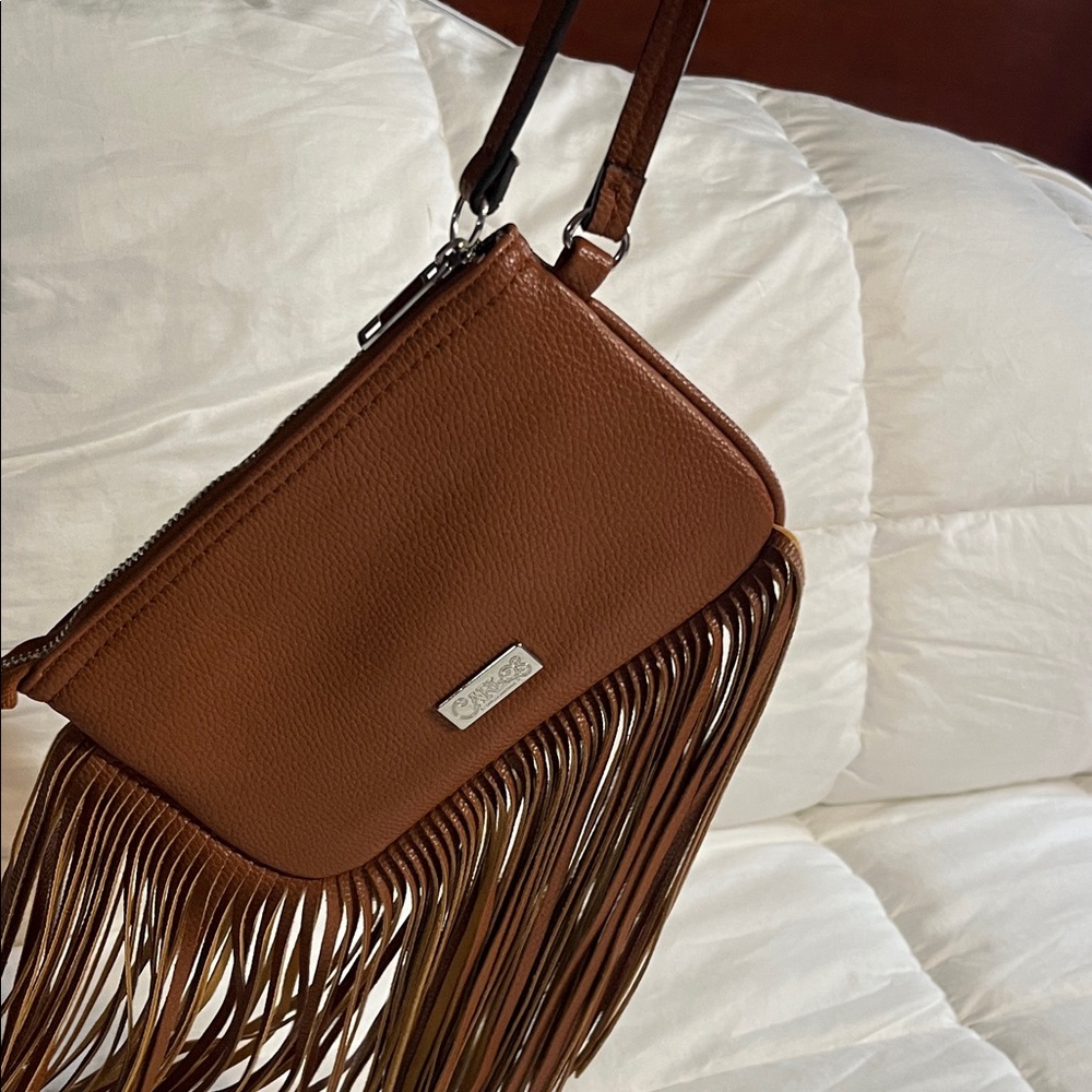 Carlos by Carlos Santana very cute Tan Leather Fringe wristlet clutch bag